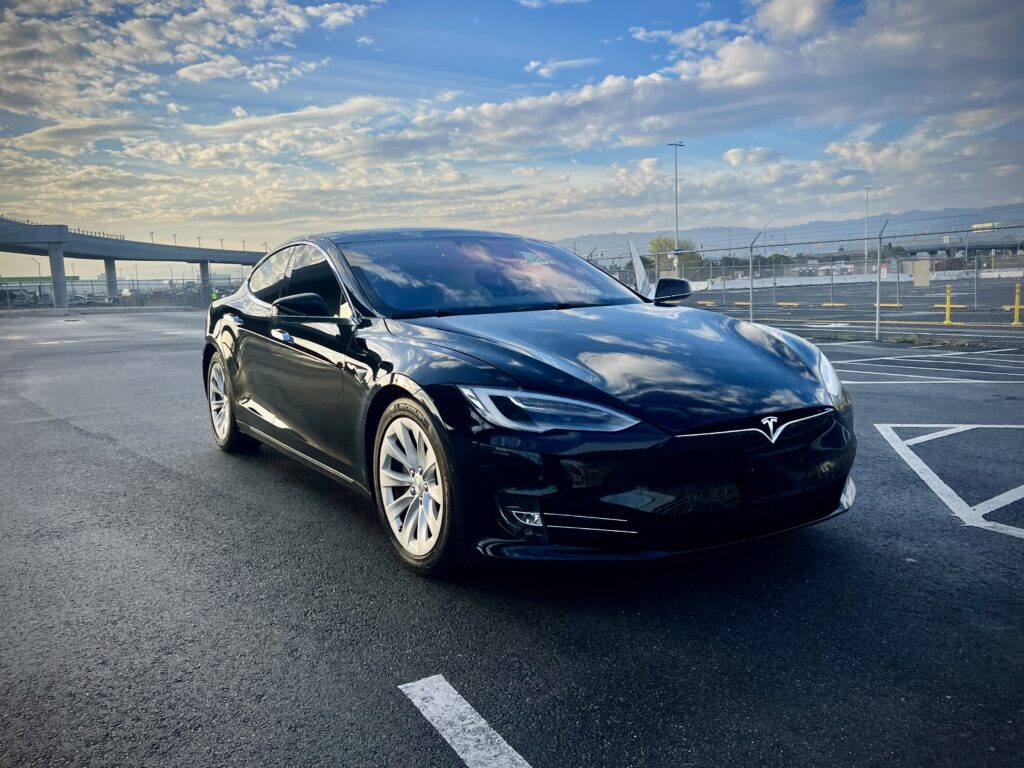 Tesla Model S san francisco airport clouds california luxury car rental